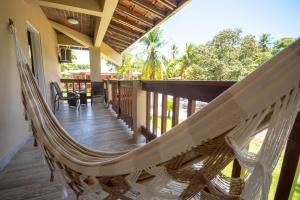 Un balcon sau o terasă la Village Paraíso Tropical