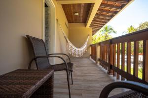 Un balcon sau o terasă la Village Paraíso Tropical