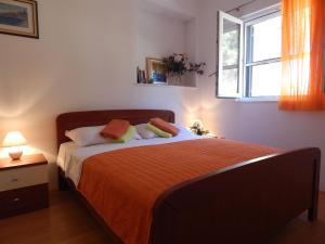 Postel nebo postele na pokoji v ubytování Apartment Deni