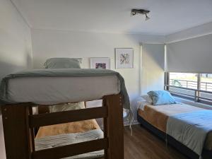 Postel nebo postele na pokoji v ubytování Espectacular Bahía Bonita depto 23