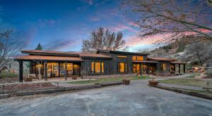 a large house with a lot of windows at Canyon Casitas at Zion in Springdale