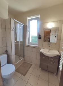Kúpeľňa v ubytovaní Widok apartamenty,domki,pokoje