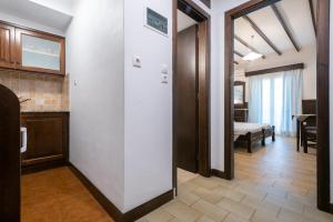 a hallway with a door leading to a room at Afrodite Hotel Apartments in Myrina