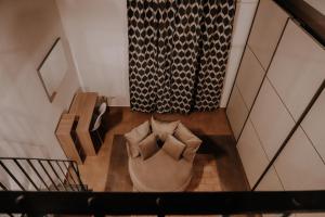 A seating area at Appartamento - Grammichele Privitera rooms & apartments Gold
