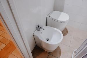 A bathroom at Appartamento - Grammichele Privitera rooms & apartments Gold