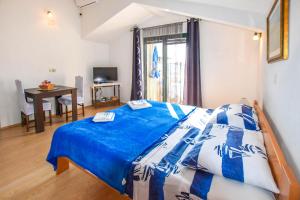 Postel nebo postele na pokoji v ubytování Apartments Studenac