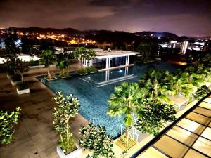Výhled na bazén z ubytování Tiara Imperio Studio 酒店风格与阳台泳池美景 nebo okolí