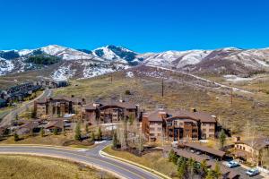 an aerial view of a resort with snow covered mountains at The Restful Retreat in Park City