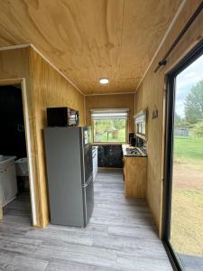 Kuchyň nebo kuchyňský kout v ubytování Tiny House Valle Escondido (2 personas)