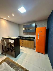 Virtuvė arba virtuvėlė apgyvendinimo įstaigoje Apartamento pé na areia - Praia Sul