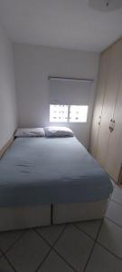 Posteľ alebo postele v izbe v ubytovaní Apartamento 2 quartos, centro Balneario camboriu, Internet free