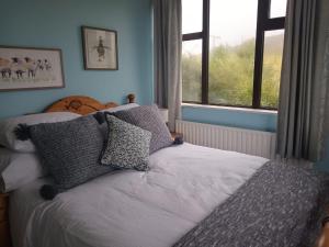 En eller flere senger på et rom på The Ramblers Rest B&B