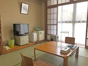 TV a/nebo společenská místnost v ubytování Hotel Harumoto