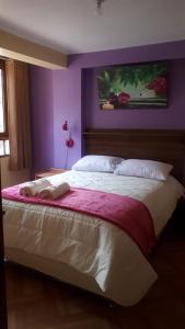 Een bed of bedden in een kamer bij casa marfil tourist house