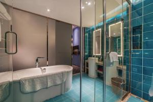 Koupelna v ubytování Nanxianglou Art Hotel