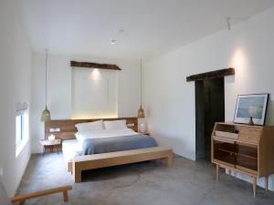 Φωτογραφία από το άλμπουμ του Ting Jian Empty Yard Pastoral Design Residential Dali Shop σε Νταλί