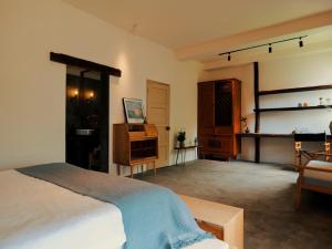 Φωτογραφία από το άλμπουμ του Ting Jian Empty Yard Pastoral Design Residential Dali Shop σε Νταλί
