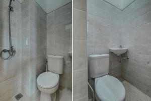 a bathroom with a toilet and a sink at OYO Life 93289 Jelita Residence 2 in Semarang