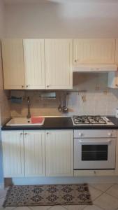 Apartment Residence Valledoria 2 tesisinde mutfak veya mini mutfak