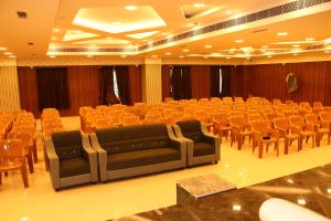 a large room with a lot of chairs in it at SAS SQUARE in Tiruchchirāppalli