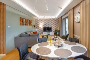 TV a/nebo společenská místnost v ubytování Rio de Mare - Nadmorze Apartments