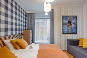 Postel nebo postele na pokoji v ubytování Rio de Mare - Nadmorze Apartments