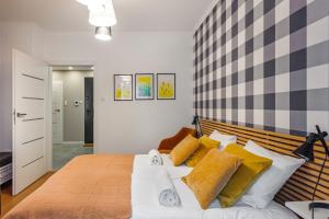 Postel nebo postele na pokoji v ubytování Rio de Mare - Nadmorze Apartments