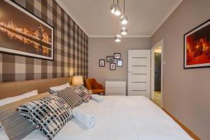 Postel nebo postele na pokoji v ubytování Rio de Mare - Nadmorze Apartments