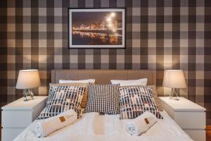 Postel nebo postele na pokoji v ubytování Rio de Mare - Nadmorze Apartments