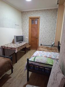 Postel nebo postele na pokoji v ubytování GUEST HAUSE & HOSTEL 15a