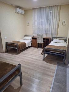 Postel nebo postele na pokoji v ubytování GUEST HAUSE & HOSTEL 15a