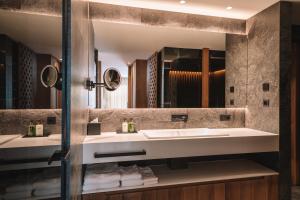 A bathroom at Residence Chalet L'Salvan