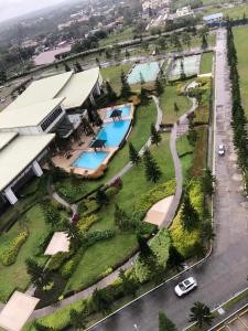 an overhead view of a park with two swimming pools at Wind Suites in Tagaytay