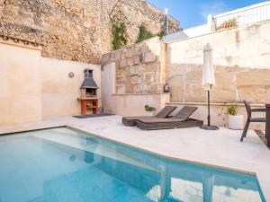 Bazén v ubytování Townhouse San Sebastia by Sunvillas Mallorca nebo v jeho okolí