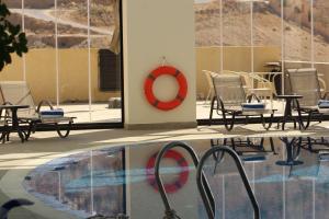 Bazén v ubytování H Luxury Hotel nebo v jeho okolí