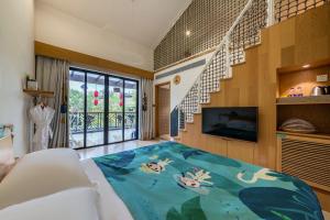 Sjónvarps- og/eða afþreyingartæki á Little Hakka Hotel