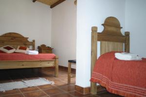 Una cama o camas en una habitación de Hostal Las Tinajas de Cachi