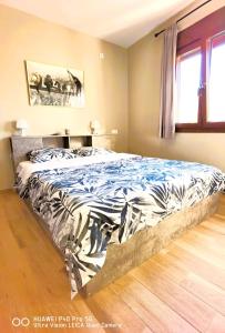 a bedroom with a large bed in a room at River House in Volos