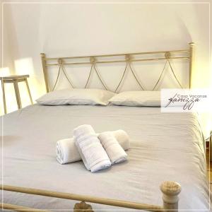 Postel nebo postele na pokoji v ubytování trullo a volte a stella + 15 fotografií