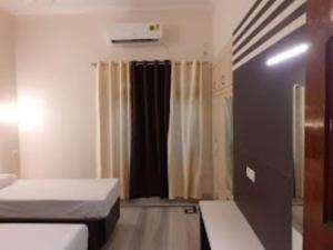 Piccola camera con 2 letti e tenda di Hotel Paradise Shivpur , Varanasi a Varanasi
