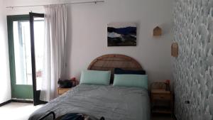 Posteľ alebo postele v izbe v ubytovaní La Torre 32 atic