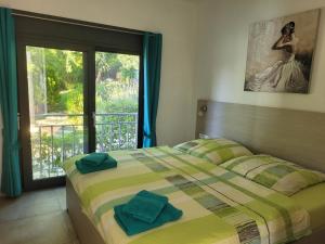 Postel nebo postele na pokoji v ubytování Villa Olivia