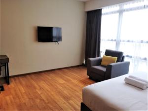Imperial Suites @Bangsar by Plush TV 또는 엔터테인먼트 센터