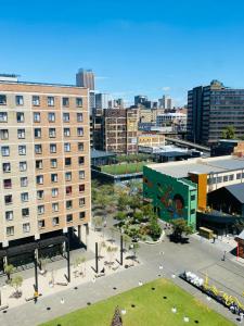 an aerial view of a city with buildings at Just Vibes at 0953 Maboneng Precinct in Johannesburg