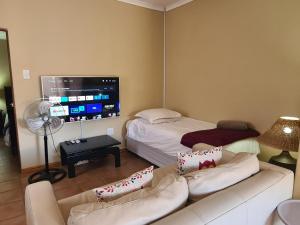 מיטה או מיטות בחדר ב-Hexberg Cottage