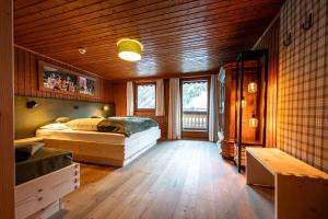 Łóżko lub łóżka w pokoju w obiekcie Panorama-Apartments Oberkofl
