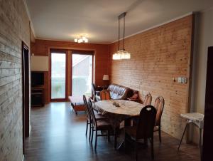 Posezení v ubytování Apartmán v dřevěném domě