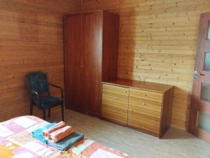 Posteľ alebo postele v izbe v ubytovaní Apartmán v dřevěném domě