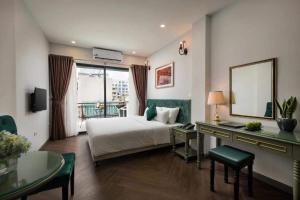 Ліжко або ліжка в номері Gatsby Central Hotel Hanoi