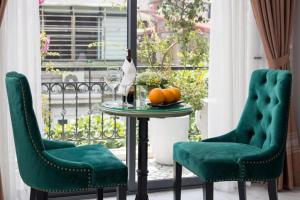 Зона вітальні в Gatsby Central Hotel Hanoi